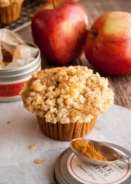 Dutch Apple Pie Muffins. A whole wheat applesauce muffin piled high with chopped apples and buttery crumb topping.