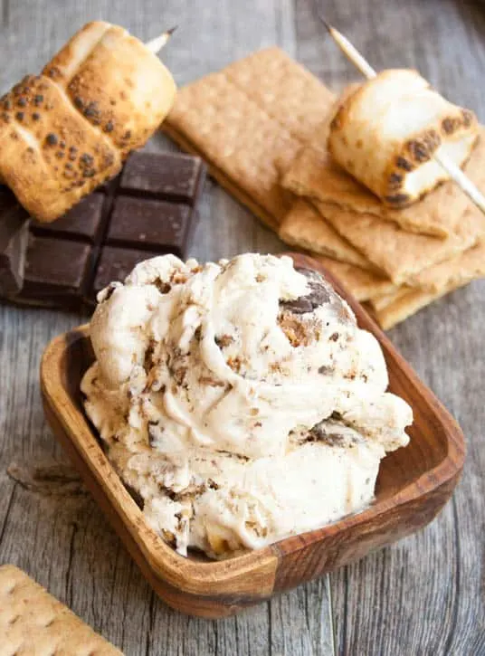 Ultimate S'mores Ice Cream. Over the top flavor with roasted marshmallows, creamy dark chocolate ganache and tender graham cracker crust!