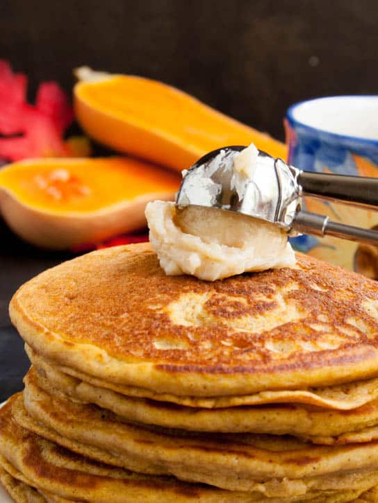 Whole Wheat Butternut Squash Pancakes with Whipped Maple Butter are tender, hearty yet fluffy, and perfect with a buttery sweet topping.
