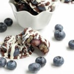 Chocolate Covered Blueberry Clusters. Fresh, plump and juicy blueberries are covered in dark and white chocolates for a refreshingly sweet summer treat!