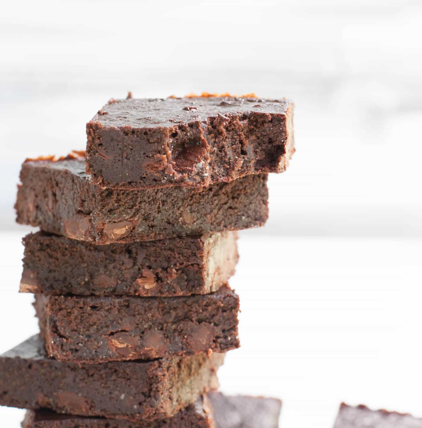 Fudgy Zucchini Brownies. A super fudgy brownie that mixes up easily in your food processor! Lower in sugar, flour and fat than many traditional brownie recipes.
