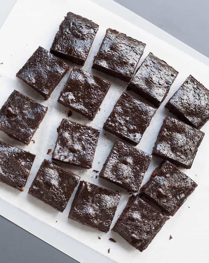 One Bowl Fudgy Pumpkin Brownies uses pumpkin puree and a hit of pumpkin spice. The texture is reminiscent of flourless chocolate cake mashed up with a pumpkin pie. So good!