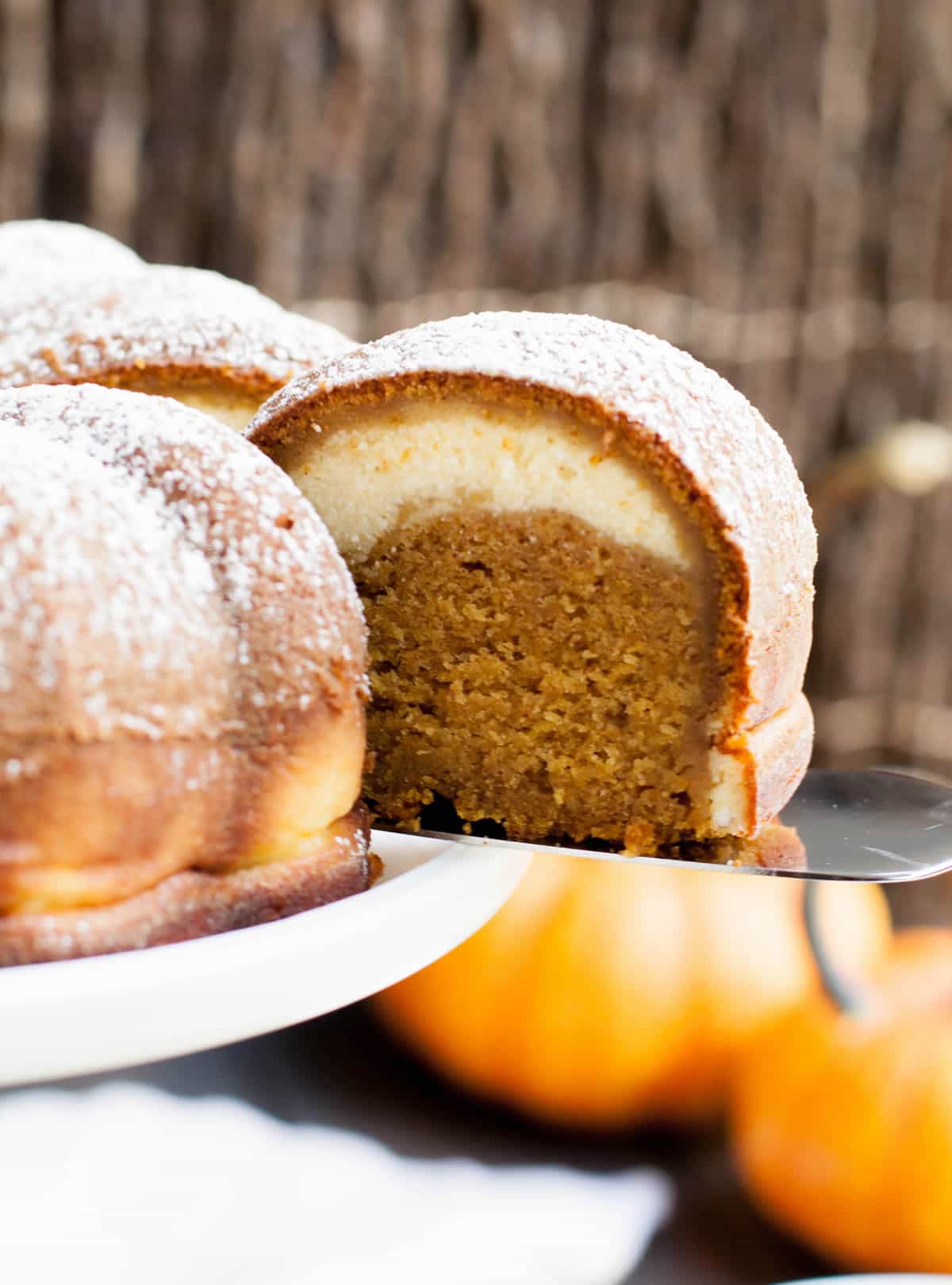 Pumpkin Ricotta Bundt Cake. Pour a sweet ricotta custard over the batter before baking. It will magically bake into a lovely swirl in this delicious cake.