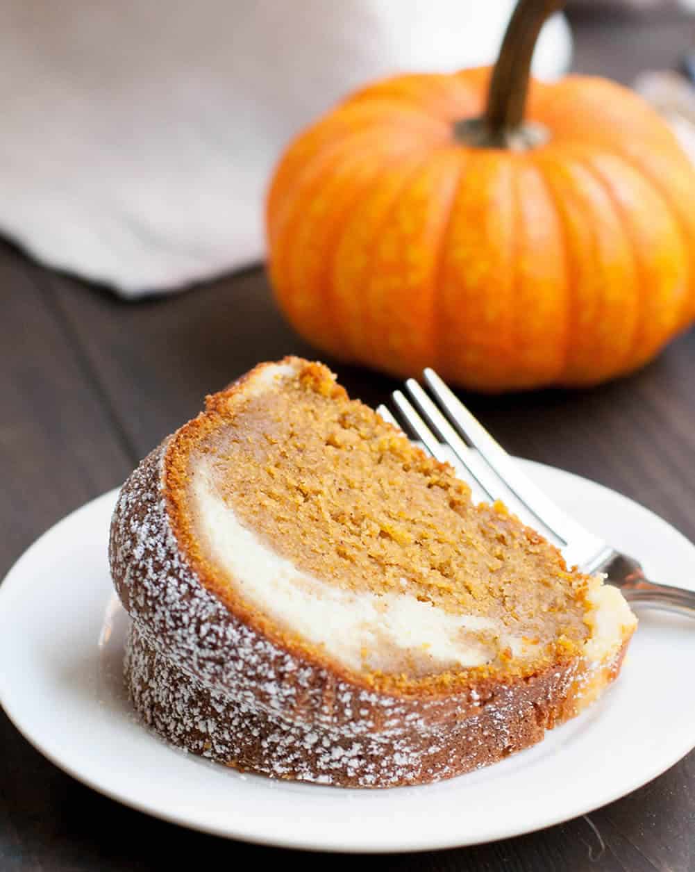 Pumpkin Ricotta Bundt Cake. Pour a sweet ricotta custard over the batter before baking. It will magically bake into a lovely swirl in this delicious cake.