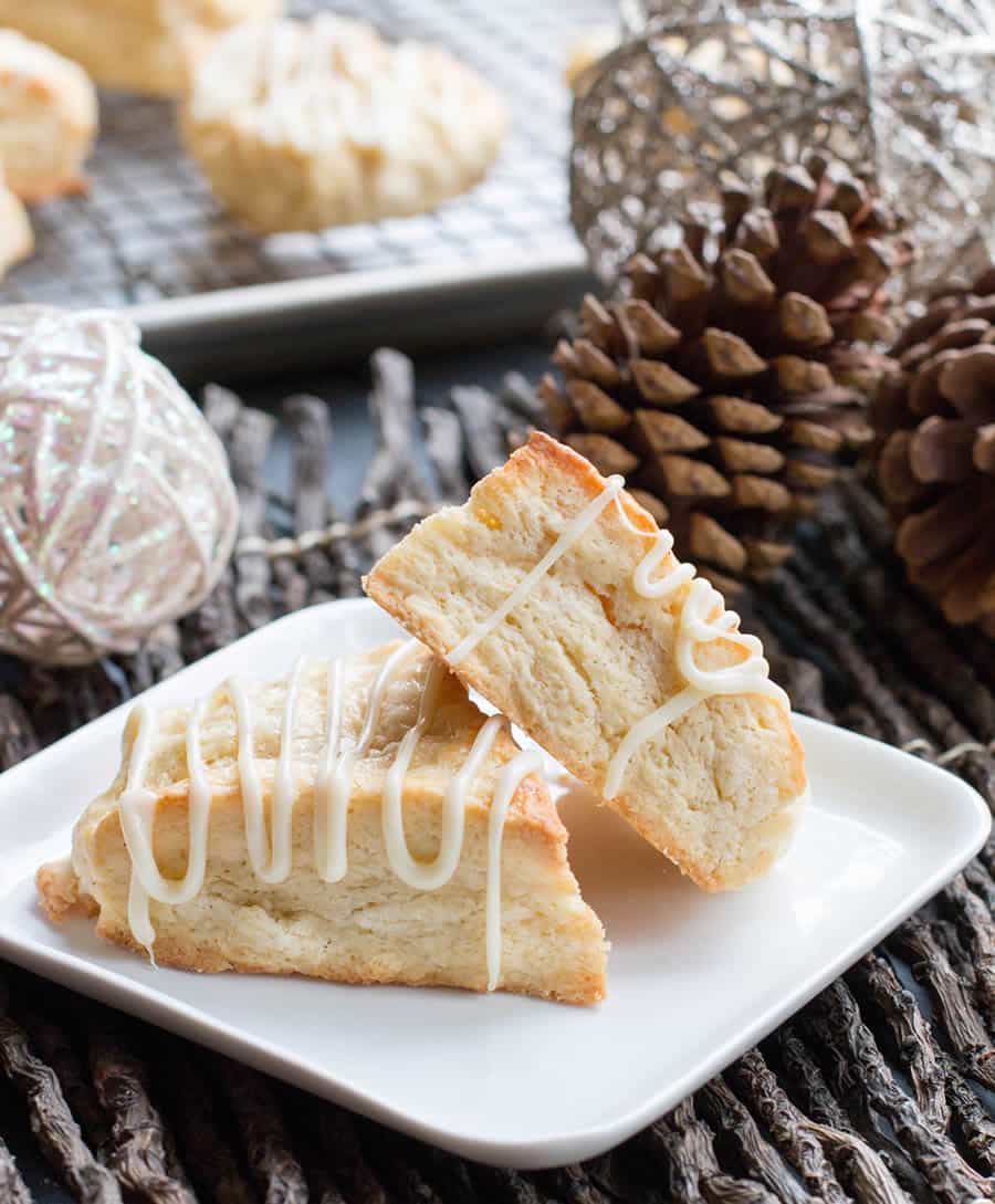 Egg Nog Scones with White Chocolate Egg Nog Ganache. Rich, buttery egg nog scones are drizzled with a creamy ganache & spiced with freshly grated nutmeg!