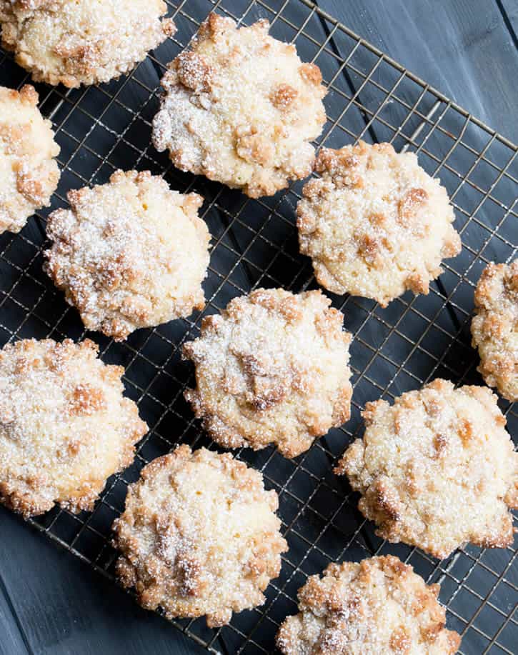 Egg Nog Crumb Muffins, rich with egg nog, topped with big chunks of sweet buttery crumbs, then graced with a dusting of confectioner's sugar.
