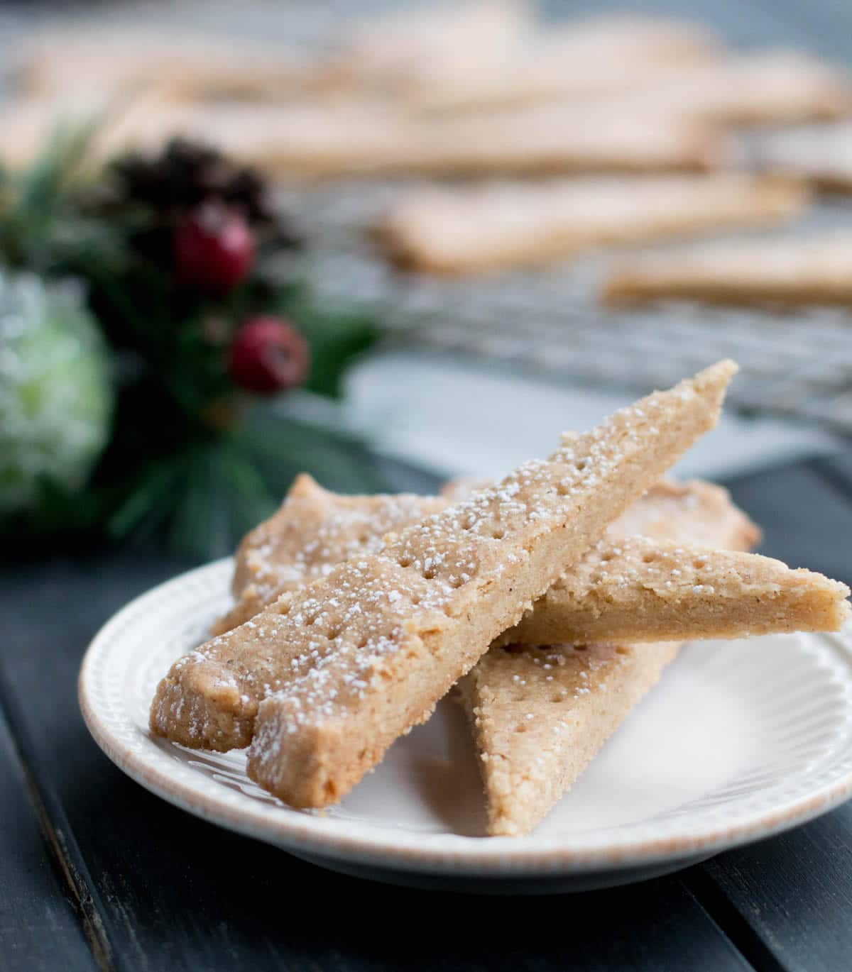 Spiced Shortbread mixes up in one bowl and bakes up to a lovely buttery, crisp but tender cookie that has the added warmth of cinnamon, ginger and cloves.