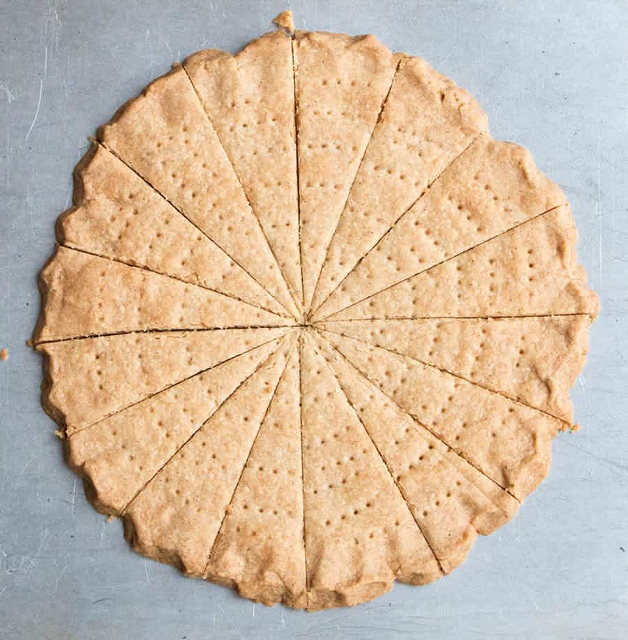 An overhead view of the still connected circle of freshly baked Spiced Shortbread by themerchantbaker.com