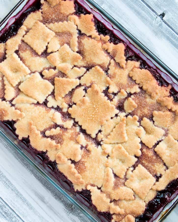 Sugar Cookie Cherry Cobbler. Sweet, juicy cherries bake beneath a tender, yet crispy crust of buttery sugar cookies. A fun twist on traditional cobbler.