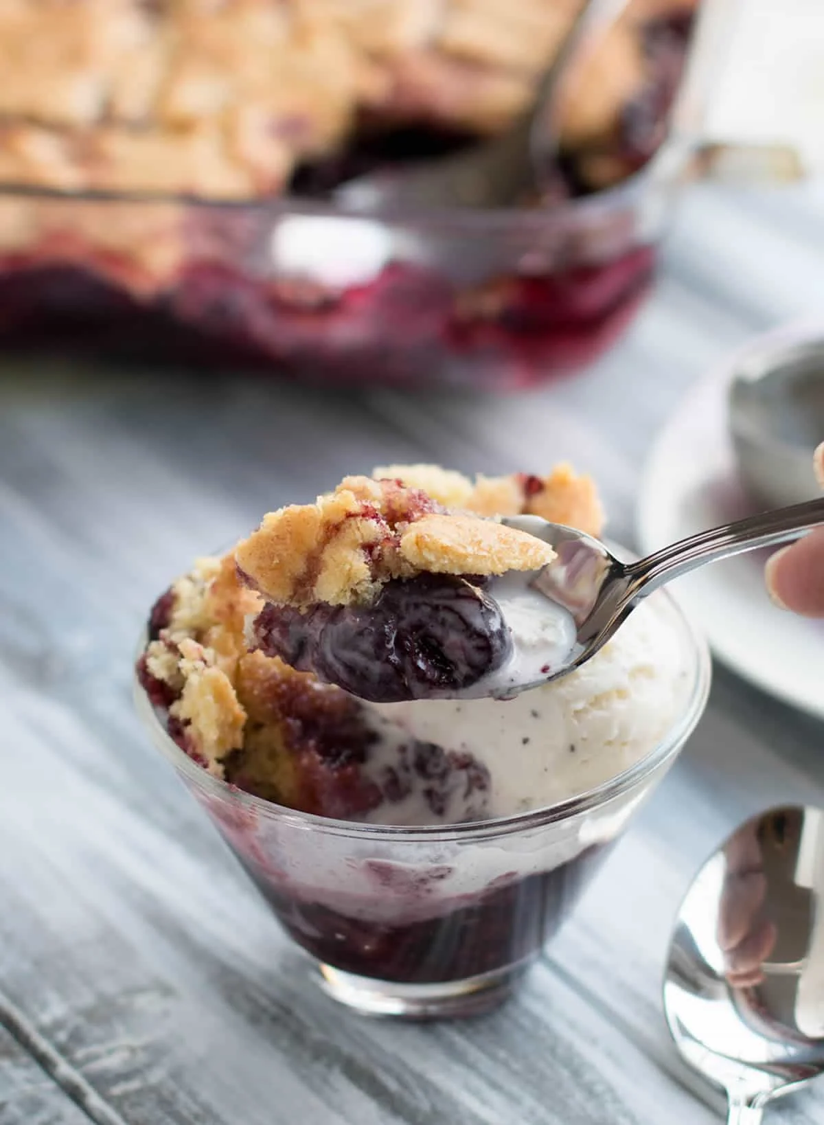 Sugar Cookie Cherry Cobbler. Sweet, juicy cherries bake beneath a tender, yet crispy crust of buttery sugar cookies. A fun twist on traditional cobbler.