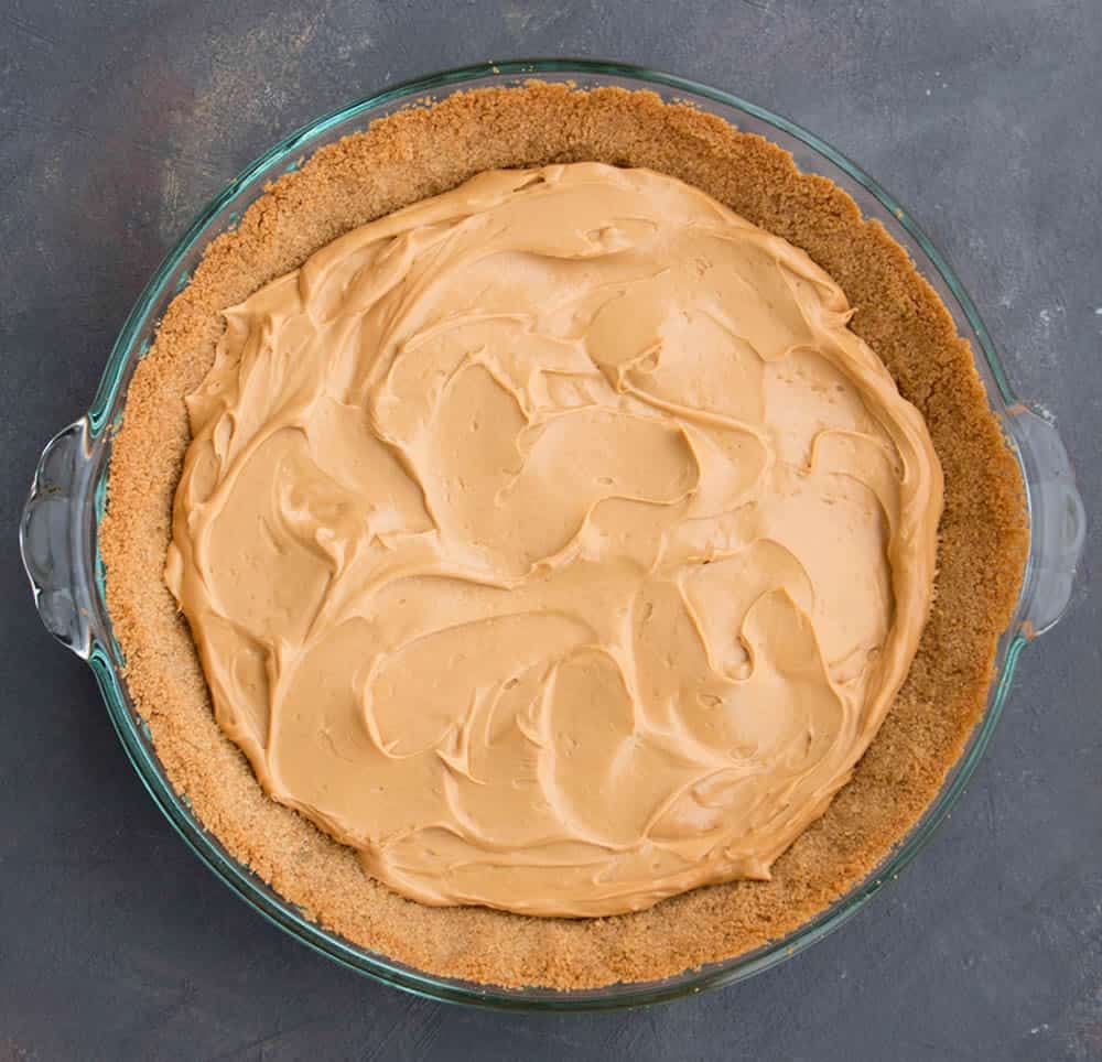 Easy Banoffee Cream Pie pairs the short cut of dulce de leche with the twist of adding cream cheese. A drizzle of Nutella syrup takes it over the top!