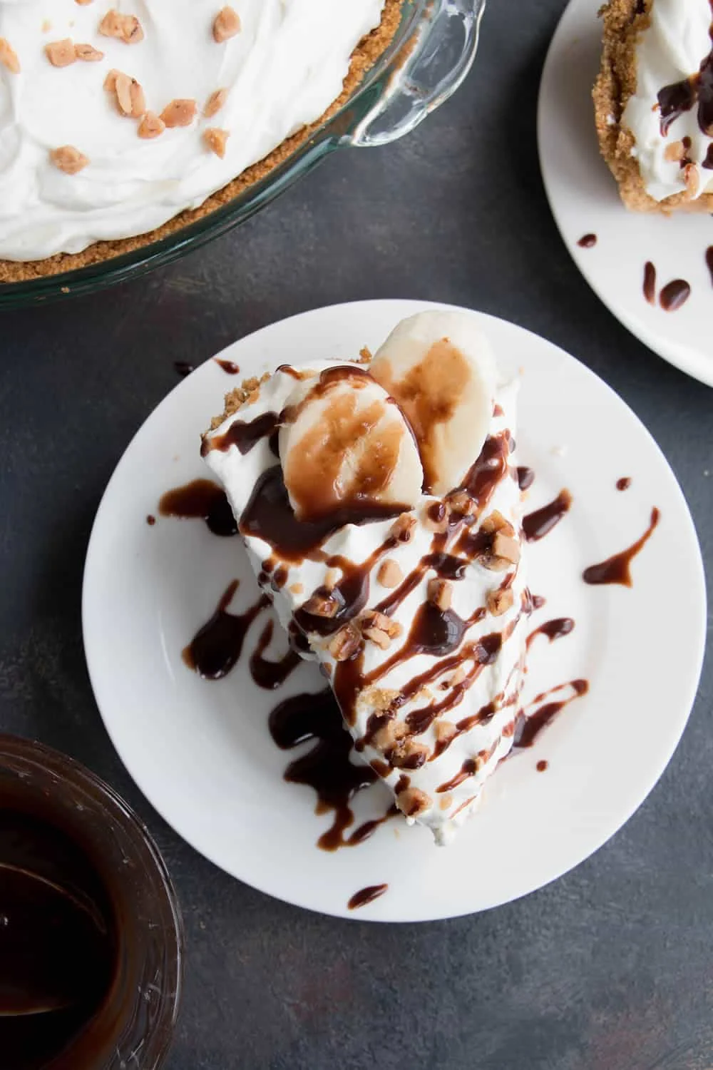 Easy Banoffee Cream Pie pairs the short cut of dulce de leche with the twist of adding cream cheese. A drizzle of Nutella syrup takes it over the top!