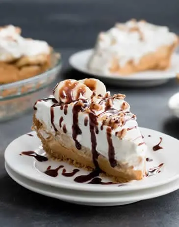 Easy Banoffee Cream Pie pairs the short cut of dulce de leche with the twist of adding cream cheese. A drizzle of Nutella syrup takes it over the top!