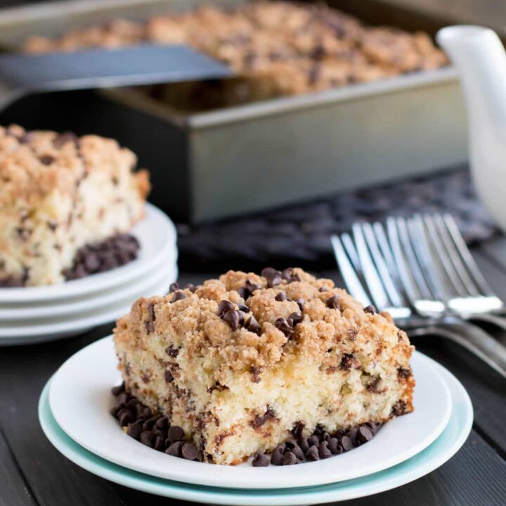 Chocolate Chip Crumb Cake. A delicious breakfast cake, rich with sour cream and butter, dotted with chocolate chips and crowned with a sweet crumb topping.