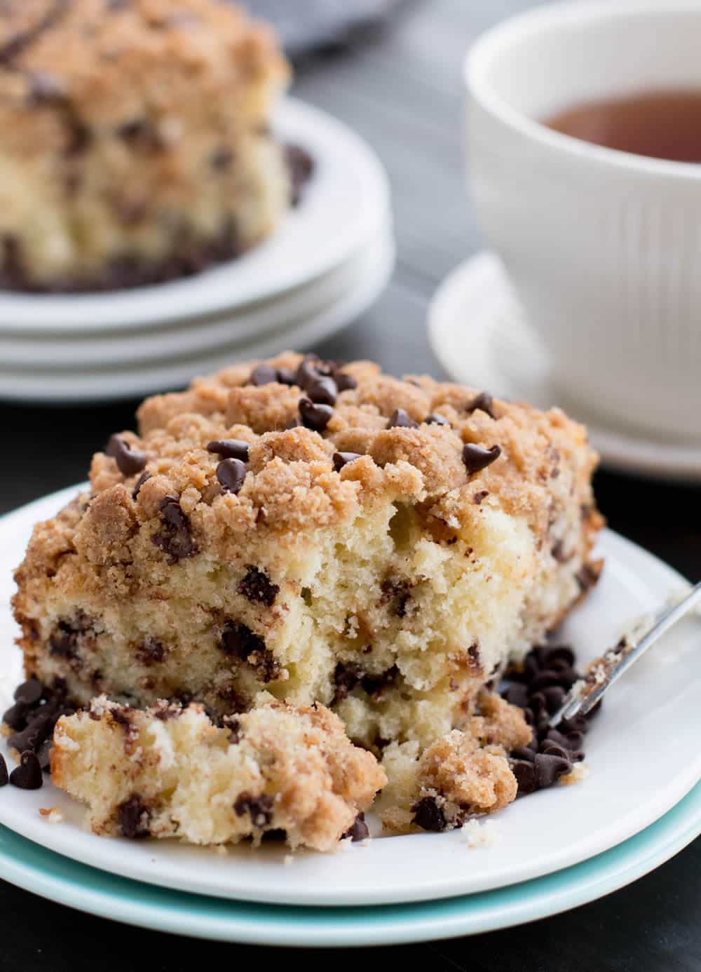 Chocolate Chip Crumb Cake. A delicious breakfast cake, rich with sour cream and butter, dotted with chocolate chips and crowned with a sweet crumb topping.