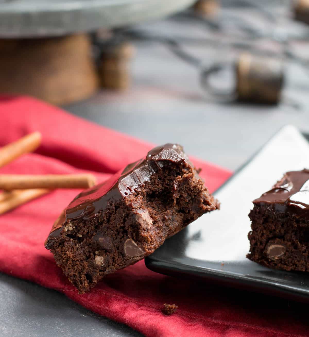 Mayan Brownies. Ground cinnamon, cinnamon chips and cayenne gently warm this deliciously spiced brownie. Fudgy cinnamon infused ganache tops it off!