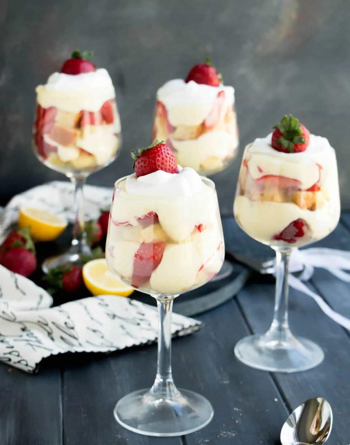 Strawberry Lemon Poundcake Trifles. A triple citrus poundcake is layered with a no bake lemon curd cheesecake filling, fresh strawberries and whipped cream!