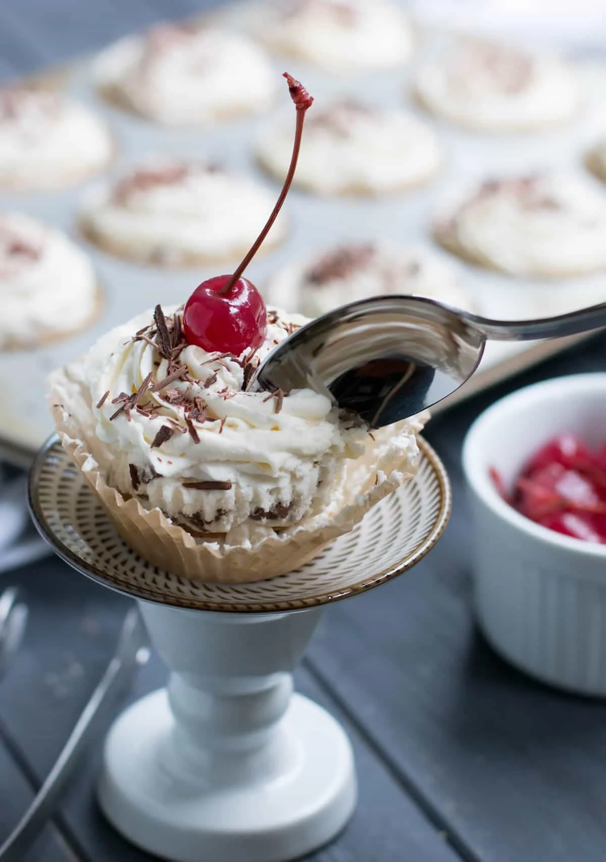 No Bake Ice Box Cannoli Cupcakes. Easy, one bowl ricotta filling is layered with vanilla wafers, topped with whipped cream, chocolate shavings and a cherry!