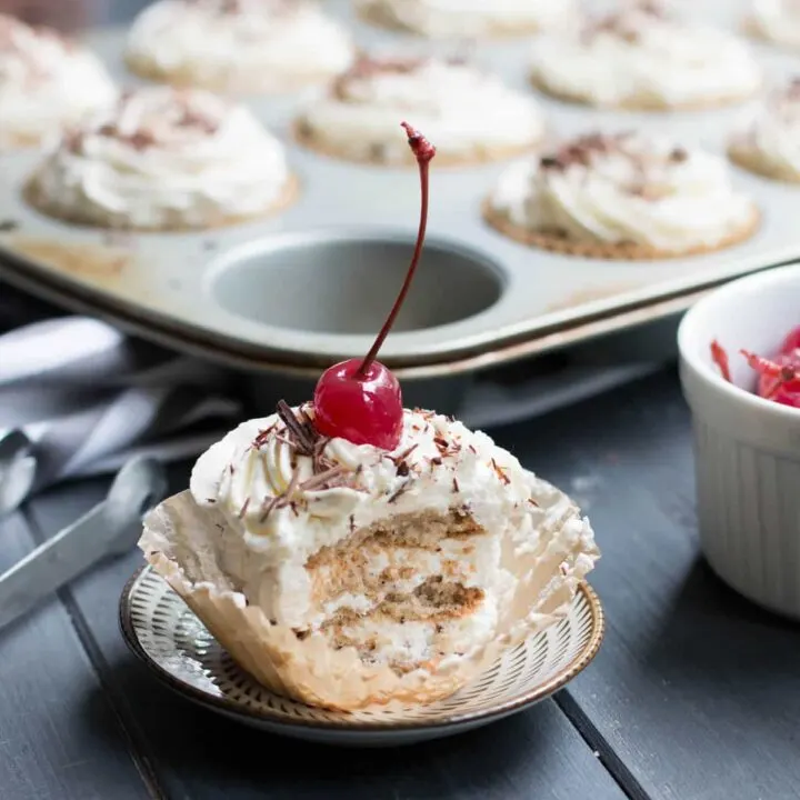 No Bake Ice Box Cannoli Cupcakes. Easy, one bowl ricotta filling is layered with vanilla wafers, topped with whipped cream, chocolate shavings and a cherry!