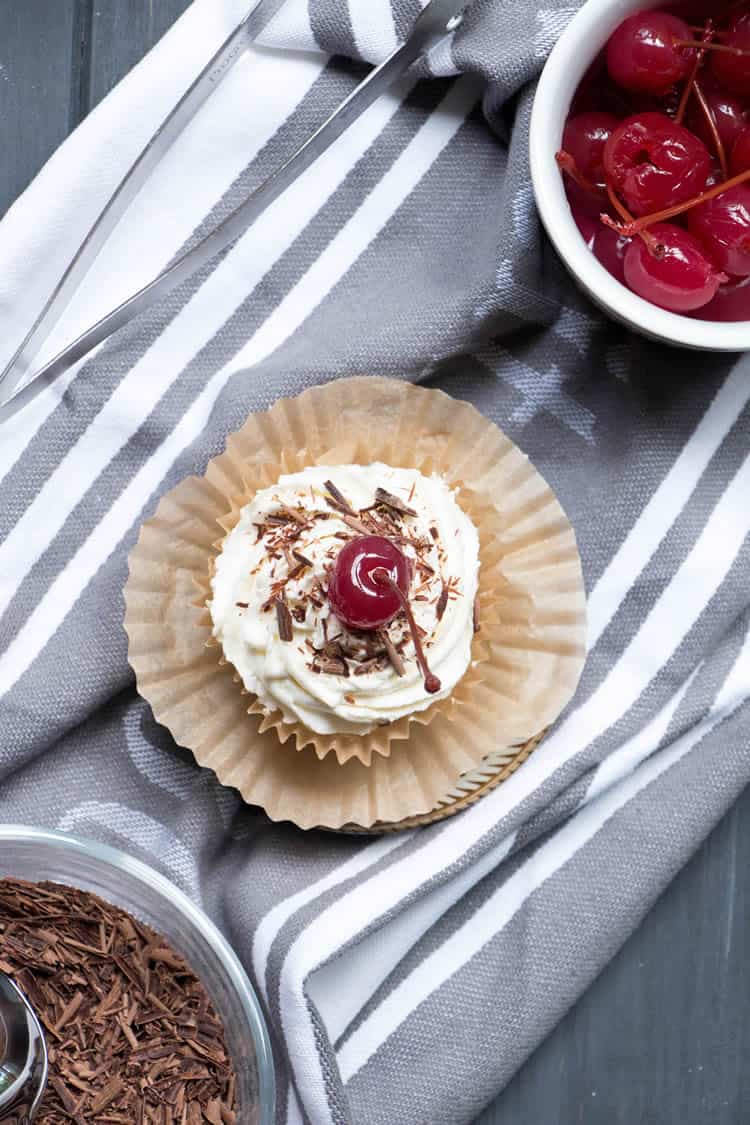 No Bake Ice Box Cannoli Cupcakes. Easy, one bowl ricotta filling is layered with vanilla wafers, topped with whipped cream, chocolate shavings and a cherry!