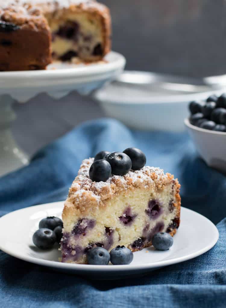 Blueberry Crumb Cake. A buttery and moist sour cream coffee cake, full of fresh blueberries and topped with a delicious brown sugar cinnamon crumb topping.