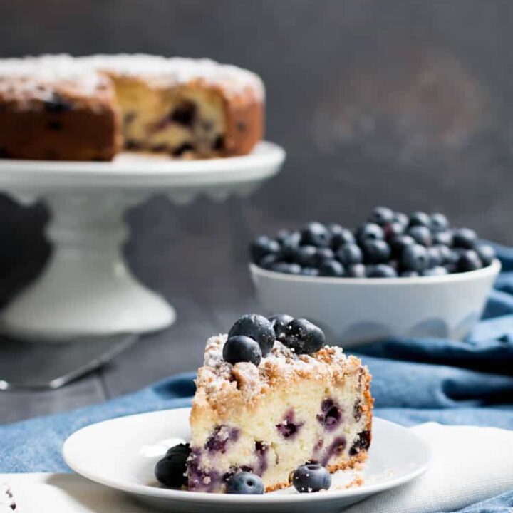 Blueberry Crumb Cake. A buttery and moist sour cream coffee cake, full of fresh blueberries and topped with a delicious brown sugar cinnamon crumb topping.