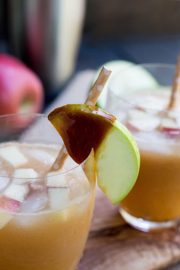 Caramel Apple Cider Cocktail. Apple Cider, caramel sauce, rum and ginger beer come together in this fall inspired cocktail. Perfect for fall gatherings.