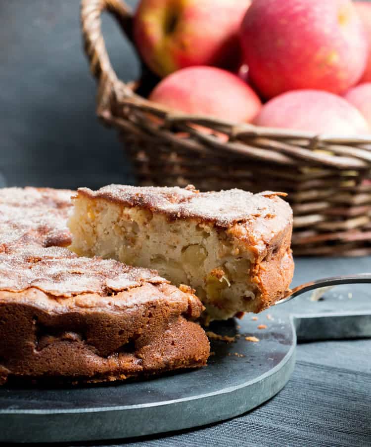 Cinnamon apple pie. Packed with apples, this cake gets a wonderful richness from cream cheese and a spicy sweetness from a cinnamon sugar powder.
