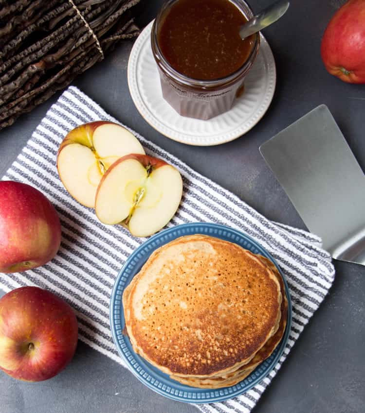 Spiced Applesauce Pancakes. Applesauce and a mix of warm fall spices fill this moist, tender pancakes. Top with caramel and make caramel apple pancakes!