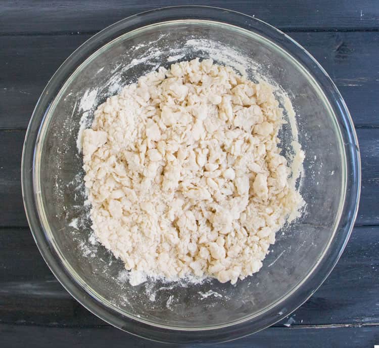 Photo showing butter and flour mixture to make Easy All Butter Pie Crust from themerchantbaker.com