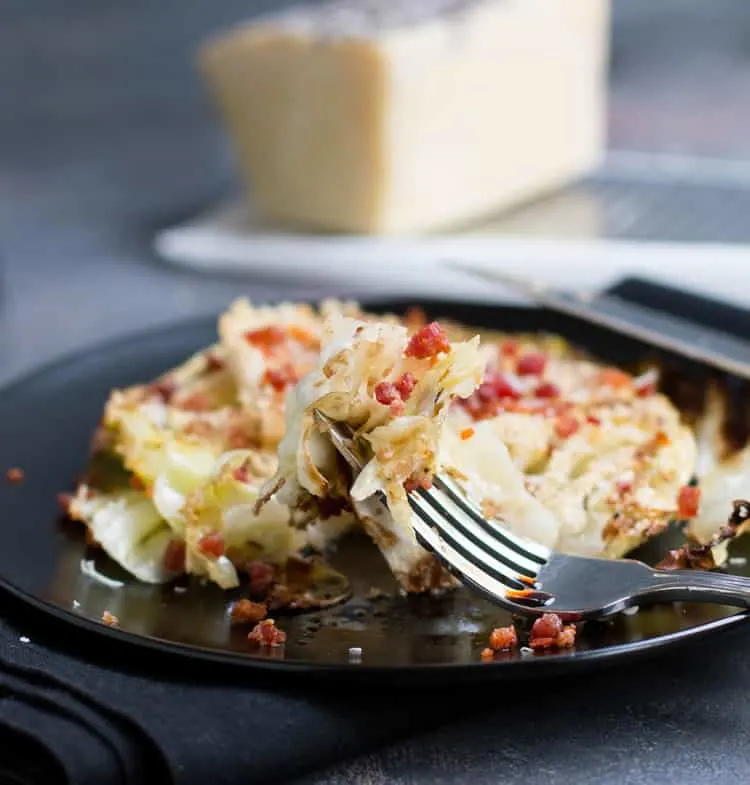 Pancetta Roasted Cabbage Steaks. Meaty slices of cabbage are roasted with seasoned panko bread crumbs, freshly grated romano cheese and crispy pancetta.