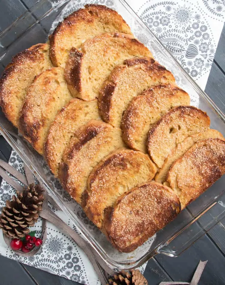 Overnight Eggnog French Toast. Easy, festive, make ahead breakfast. Hearty slices of bread baked in a creamy eggnog custard with a crunchy sugar topping!