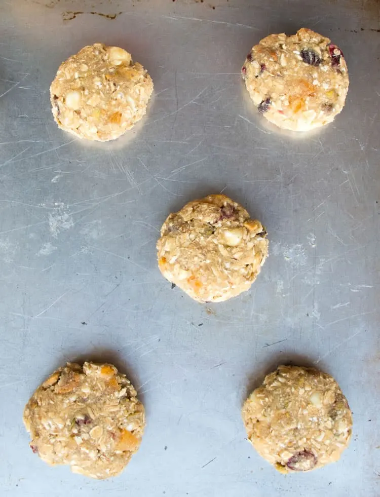 Pistachio Bark Oatmeal Cookies. Chewy oatmeal cookies filled with pistachios, cranberries, white chocolate and apricots then dipped in dark chocolate!
