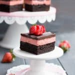 Strawberry Cheesecake Truffle Brownies. Fudgy brownies topped with a creamy, no bake cheesecake layer, then covered with a rich dark chocolate ganache. Perfect for Valentine's Day!