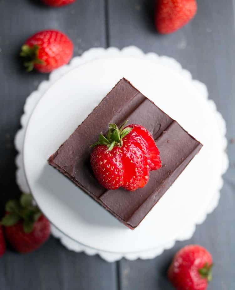 Strawberry Cheesecake Truffle Brownies. Fudgy brownies topped with a creamy, no bake cheesecake layer, then covered with a rich dark chocolate ganache. Perfect for Valentine's Day! 
