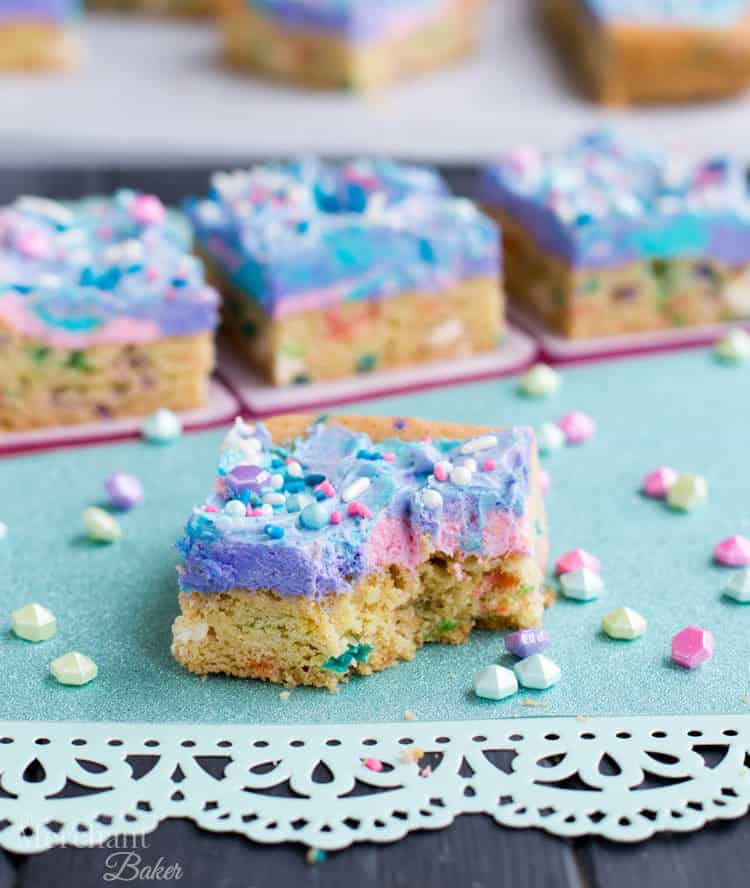 Mermaid Birthday Sugar Cookie Bars. Birthday cake flavored sugar cookie bars, topped with colorful swirls of frosting and festive sprinkles.