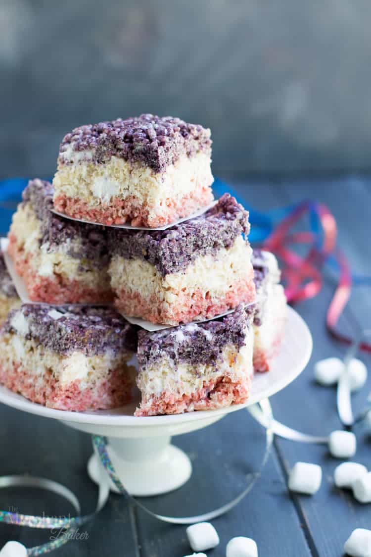 Very Berry Marshmallow Crispy Treats. Naturally flavored strawberry, blueberry and white chocolate layers of pillowy, soft crispy treats that stay soft for days. These red, white and blue bars are great for the fourth of July!