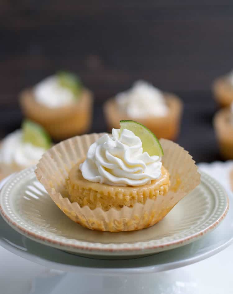 Easy Mini Key Lime Pies come together quickly with just five ingredients and one bowl. Creamy and full of fresh lime flavor, a perfect dessert for summer!
