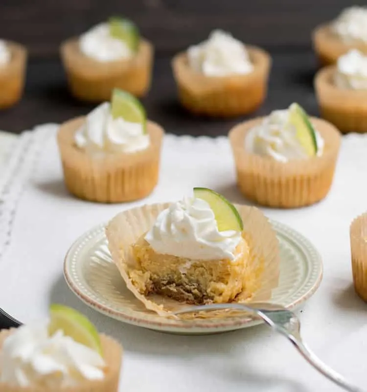 Easy Mini Key Lime Pies come together quickly with just five ingredients and one bowl. Creamy and full of fresh lime flavor, a perfect dessert for summer!