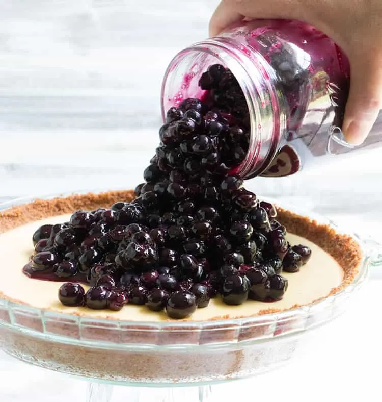Fresh Blueberry Cheesecake Pie. Classic cheesecake, baked on a graham and vanilla wafer crust and topped with a whole pie's worth of homemade pie filling!