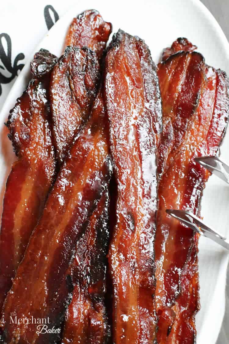 A close up image of Brown Sugar Maple Glazed Bacon from themerchantbaker.com