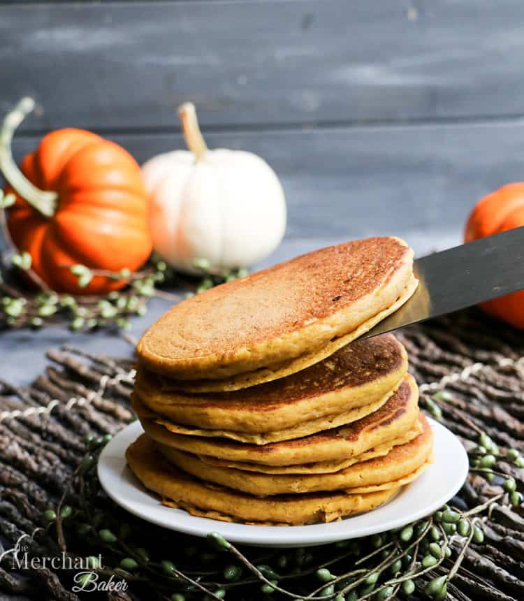 Fluffy Buttermilk Pumpkin Pancakes. Perfectly fluffy, tender pancakes full of pumpkin and pumpkin spices. Make a big batch and freeze for quick breakfasts!