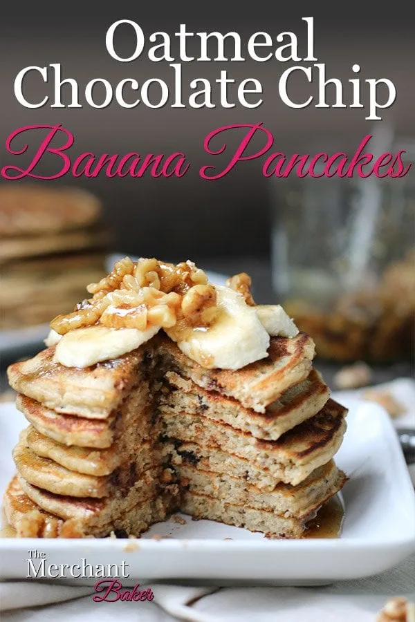 Pinterest image Stack of Oatmeal Chocolate Chip Banana Pancakes with a wedge cut topped with sliced bananas and walnut syrup from themerchantbaker.com