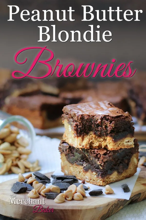 Pinterest Image stack of two, one bitten, Peanut Butter Blondie Brownies squares on a cutting board with peanuts and chocolate from themerchantbaker.com