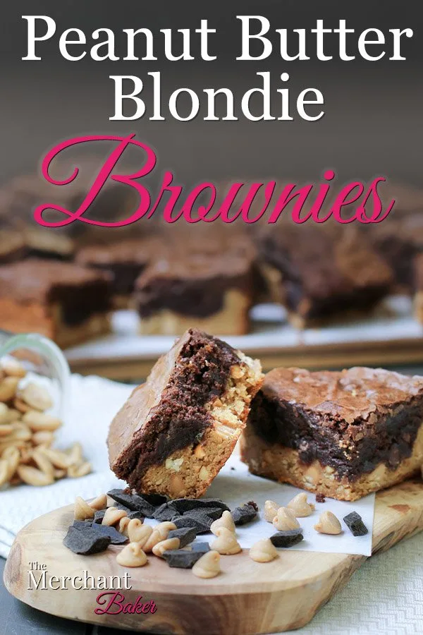 Pinterest Image stack of two, one bitten and set on an angle, Peanut Butter Blondie Brownies squares on a cutting board with peanuts and chocolate from themerchantbaker.com
