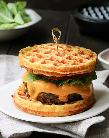 Almond Chaffle as a bun for a cheesburger by themerchantbaker.com
