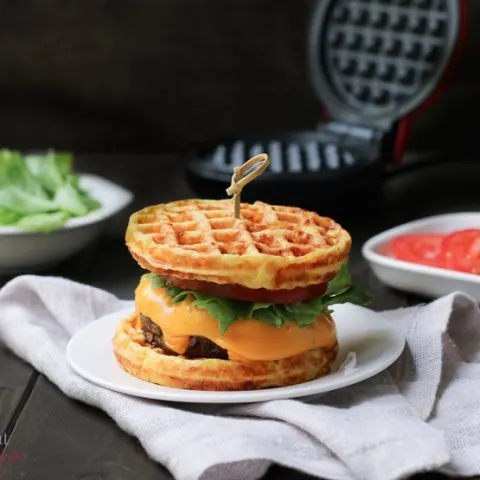 Cheeseburger made with Chaffles as the bun by themerchantbaker.com