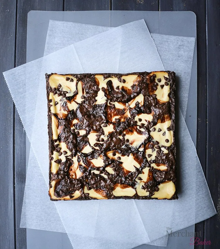 Baked Irish Cream Cheesecake Brownies from square pan by themerchantbaker.com