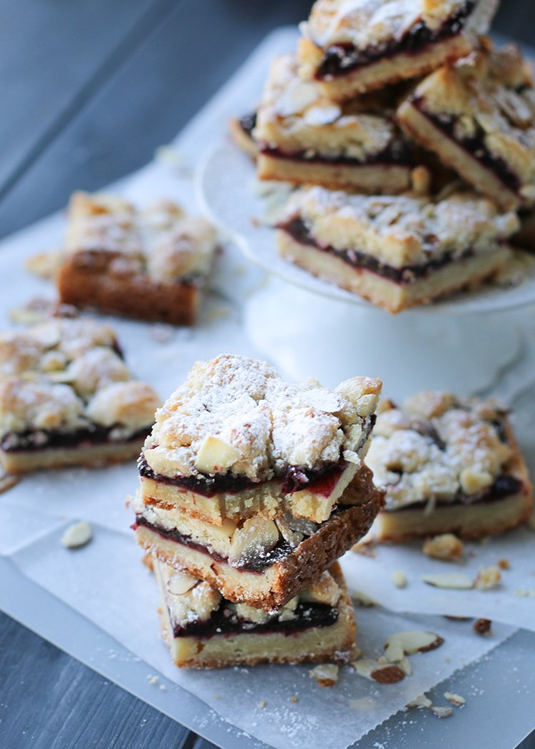 Three cherry bars stacked with a bite out of the top one
