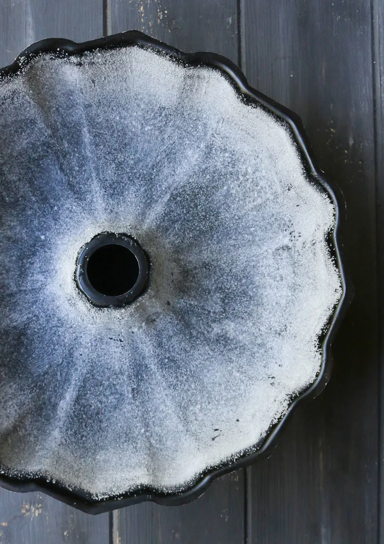 An overhead photo of a sugar coated bundt pan by themerchantbaker.com